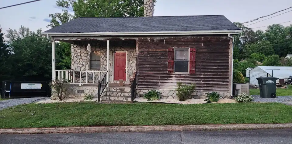 After: cottage front cleaned up with new beds