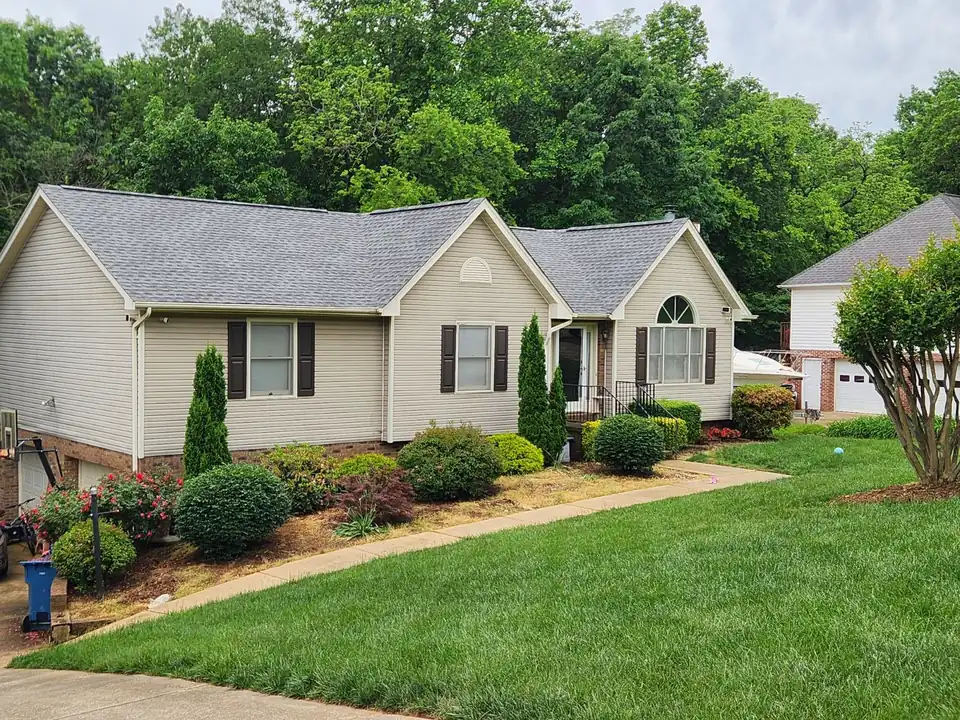 Shrub beds along a front walk